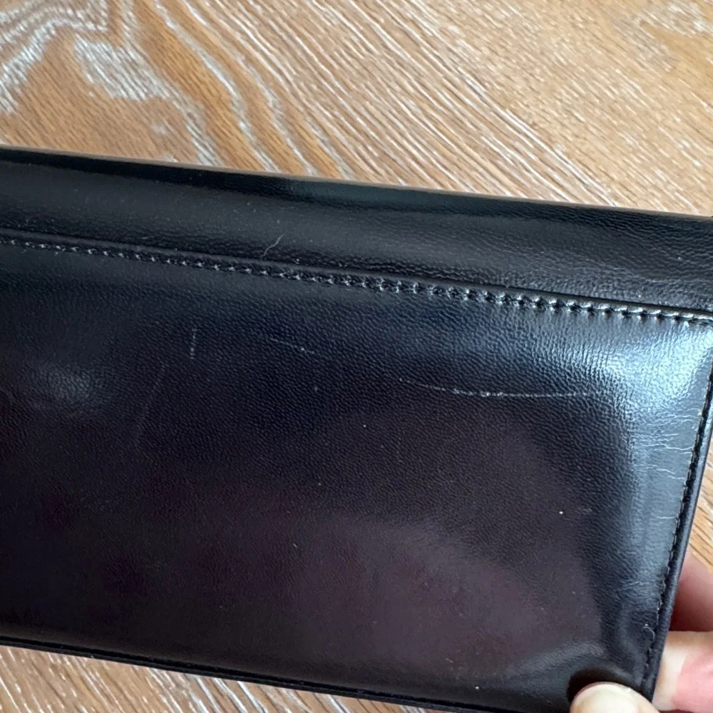Vintage Charles Jordan genuine leather clutch with geometric design